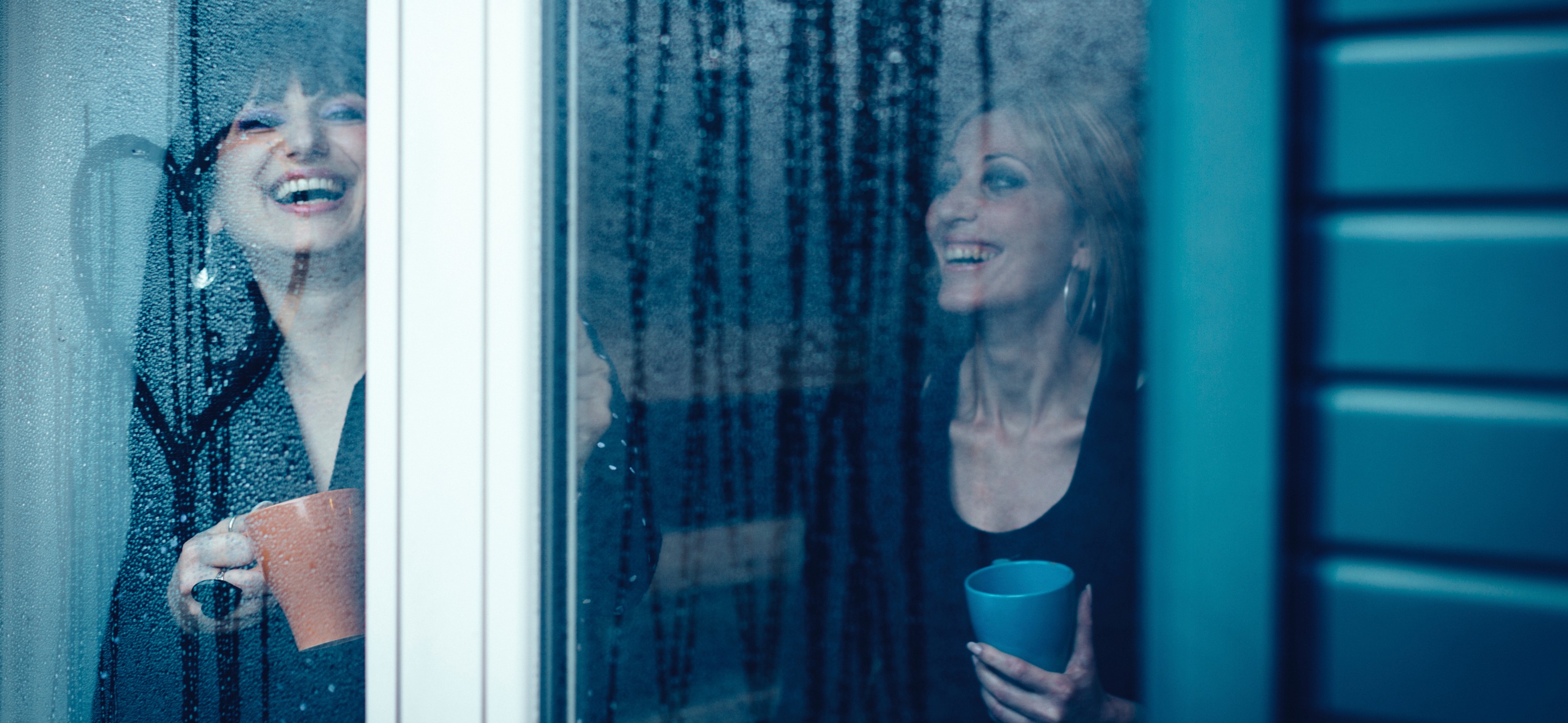 women_in_window